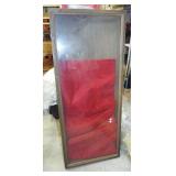 Antique glass display showcase with two doors.