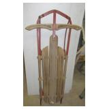 Antique rail sled with wood top. Measures: 47"