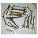 Misc. wrenches, pliers and hand tools.