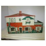 Vintage metal two story doll house. Measures 19"