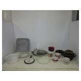 Assortment of dishes including double handled