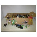 Large assortment of action figures and toys that