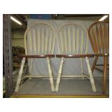 Matching pair of white and wood dining chairs.