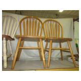 Matching pair of oak dining chairs.