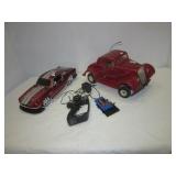 (2) RC cars. Note: Unknown working condition.