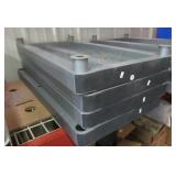 Plastic storage shelving unit with four shelves.