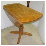 Modern wood drop leaf kitchen nook table.