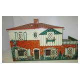 Vintage metal two story doll house. Measures 19"