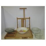 Wood art storage unit, Pyrex mixing bowls, and