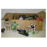 Large assortment of action figures and toys that