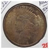 1922 Peace Silver Dollar. Nice Toning.