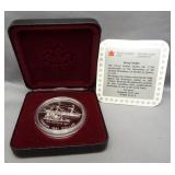 1991 Canadian 50% silver dollar.