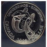 1983 Brilliant Canadian 50% silver dollar.