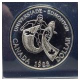 1983 Brilliant Canadian 50% silver dollar.