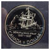 1987 Brilliant Canadian 50% silver dollar.