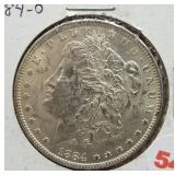 1884-O Morgan silver dollar.