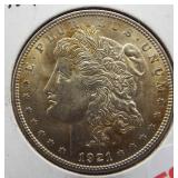 1921 Morgan silver dollar. Light gold toning, BU,