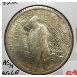 1922 Peace silver dollar. Clashed Eagle shoulder,