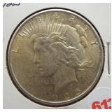 1925 Peace silver dollar. Die break reverse,