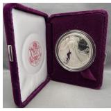 1990 American one ounce silver Eagle with box.