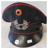 East German Military hat. Note: Has some damage.