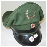 East German Military hat. Note: Has some damage.