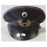 East German Military hat. Note: Has some damage.