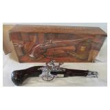 Avon black powder pistol bottle in original box.