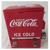 Coca-Cola toothpick dispenser.