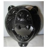 Cast iron bear head bottle opener. Measures 3.75"