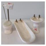Vintage miniature ceramic toilet, sink and tub.
