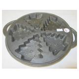 Cast iron Christmas tree mold pan. Measures 10.5"