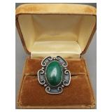 Sterling silver ring with large green stone. Size