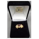 14K Yellow gold ring with purple stone. Size 9.