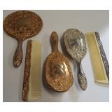 Vintage vanity items including gold colored