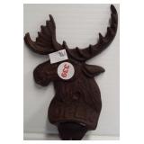 Cast iron moose head wall mount bottle opener.