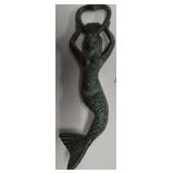 Mermaid cast iron bottle opener. Measures 7.25"