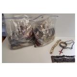 (2) Gallon bags of costume jewelry including