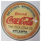 Metal Coca-Cola sign. Measures 11.5" across.