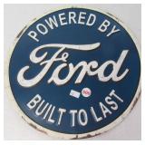Metal Ford sign. Measures 12" across.