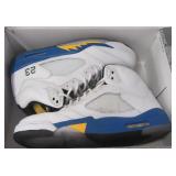 Pair of Air Jordan basketball sneakers. Size 12.