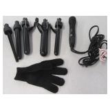 Xtava curling iron with various size attachments.