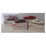 (4) Die cast vehicles in original boxes including