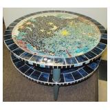 Two tier tile/mosaic coffee table. Measures 18"