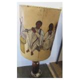 Hand carved wood lamp with painted leather shade