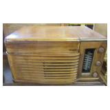 Vintage Philco radio. Measures 12" h x 23" w x