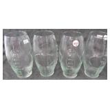 (4) Football glasses. Measure 6.5" tall.