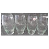 (4) Football glasses. Measure 6.5" tall.