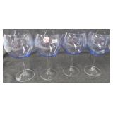 (4) Lilac colored stemmed wine glasses. Measure