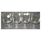 (4) Modern stemmed glasses. Measure 5" tall.